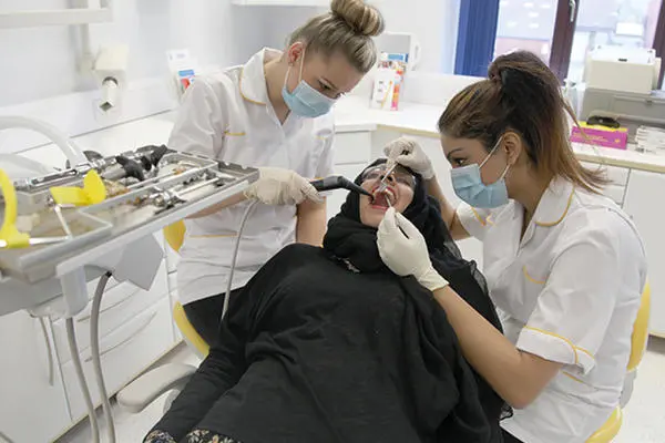 Dentistry Apprentices with patient